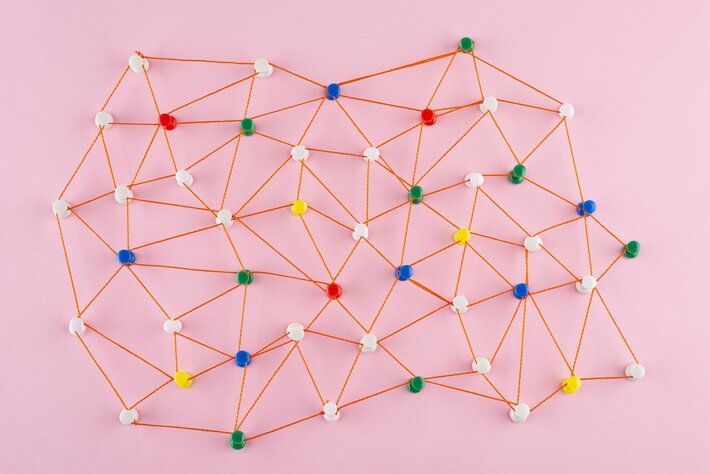 network concept with red thread flat lay